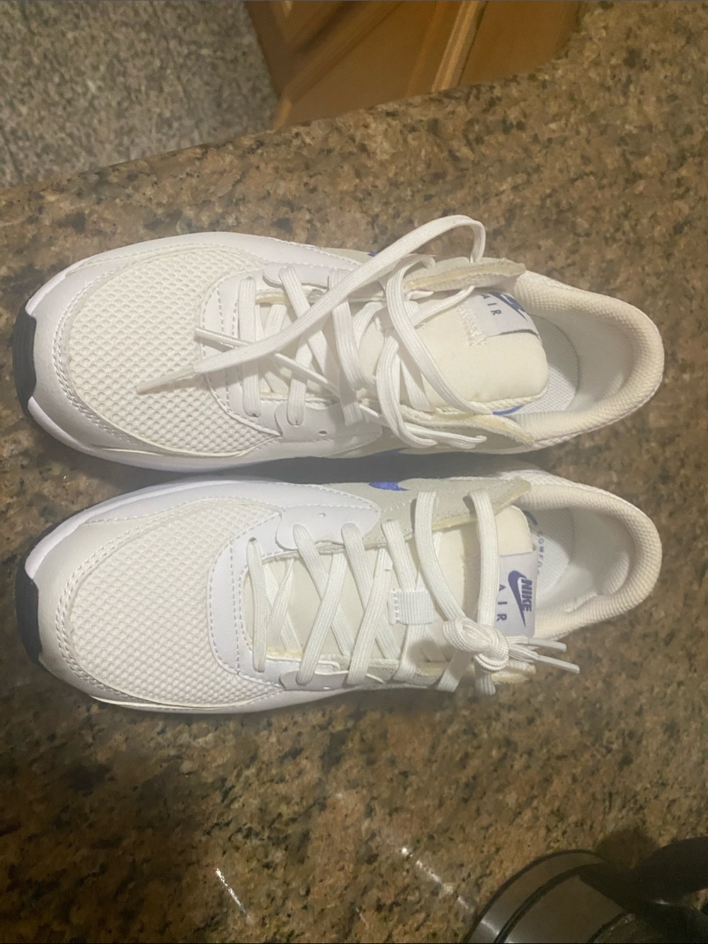 Nike women White Sneakers with Subtle Blue  accent, this is Air max line